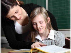 Teacher and student in the classroom to learn together-square